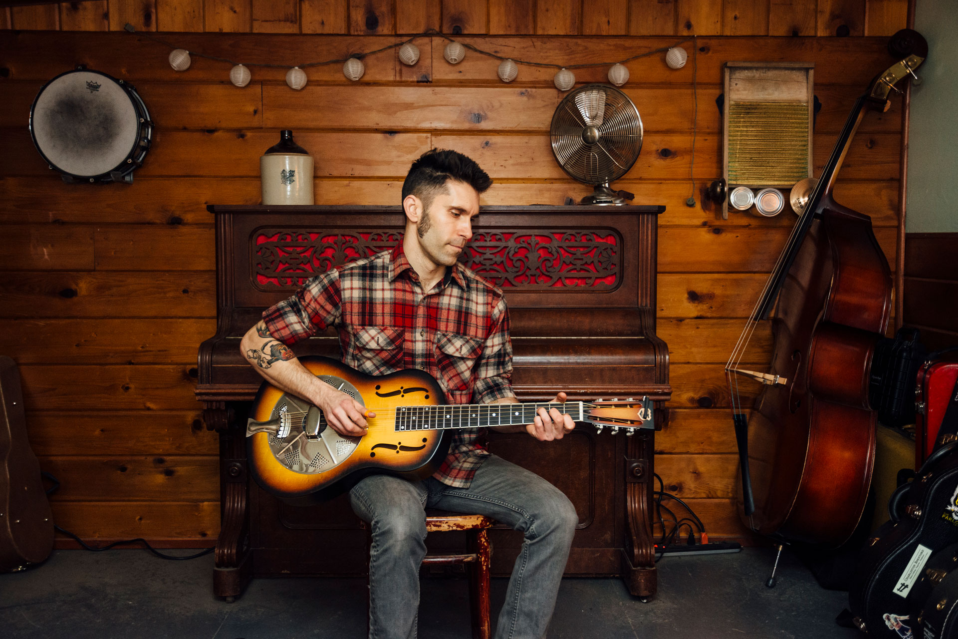 Multi-instrumentalist Brandon Olszewski of Charleston Barnyard on guitar